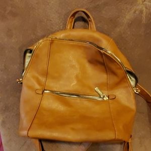 Tan backpack carried once!